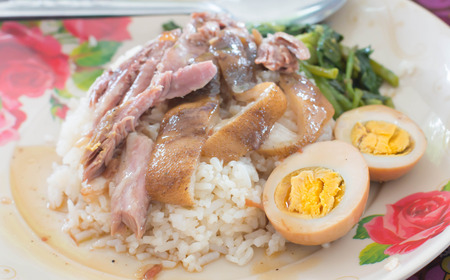 Thai stewed pork leg with rice on woodKao Kha Mooの写真素材
