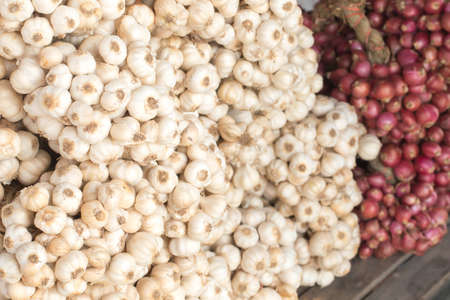 close up of garlic on market stand