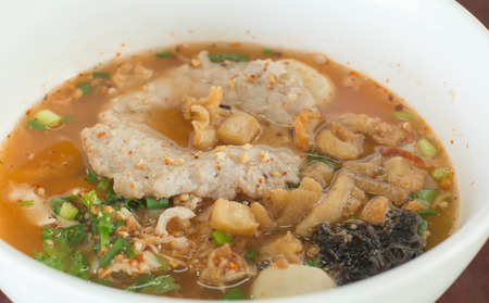 Brewed bean curd noodle or yong tau foo on a distinctively white noodle dish in Thailand