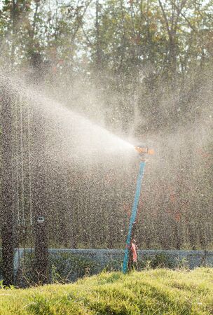 silhouette splash of water sprinklerの写真素材