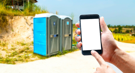 The blank screen of mobile phones, smartphones, portable toilet with a blurred background.の写真素材