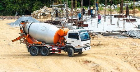foundation from cement to a new building ground truck mixer hard working