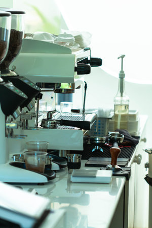 Coffee machine and coffee beans in a modern coffee shop.の写真素材