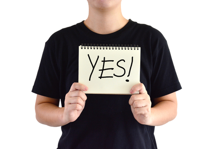 Asian man wear black shirt say yes and white backgroundの写真素材