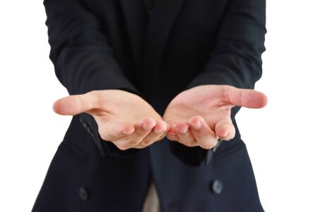 Asian man wear dark blue suit open the and white backgroundの写真素材