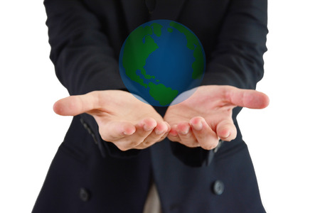 Asian man wear dark blue suit hold the world and white backgroundの写真素材