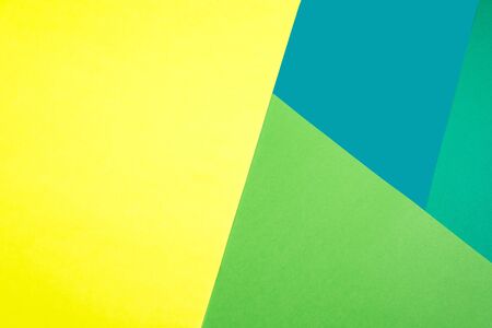 Yellow green and blue abstract triangles background textureの写真素材