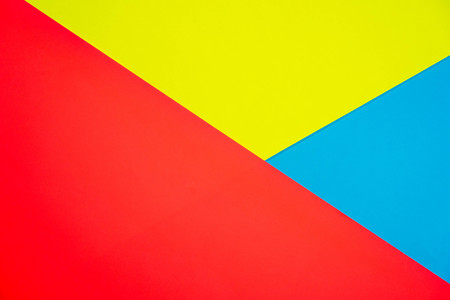 Red blue and yellow abstract triangles background textureの写真素材