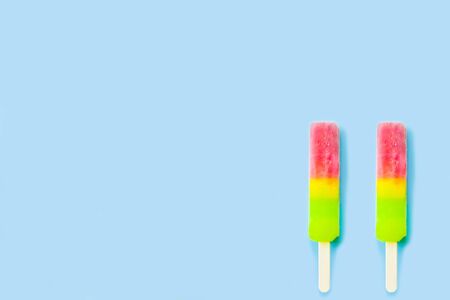 Fruit colorful Ice cream pattern/ice cream stick on pastel pink background, Soda and Strawberry and Lemon Ice creamの写真素材