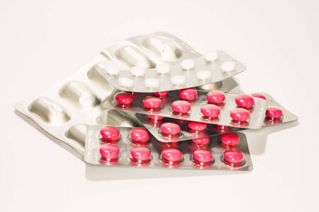 phaMany pills and capsule rmaceuticals antibiotics pills medicine /colorful antibacterials pills on white background /capsule pill medicineの写真素材