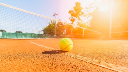 tennis ball in tennis courtの写真素材