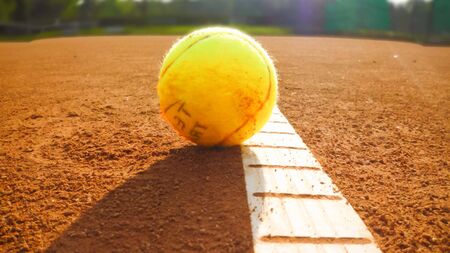 tennis ball in tennis courtの写真素材