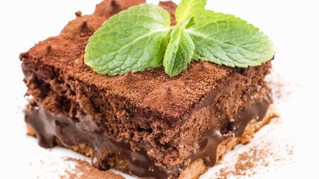 Chocolate Brownie Cake with strawberry on white plate