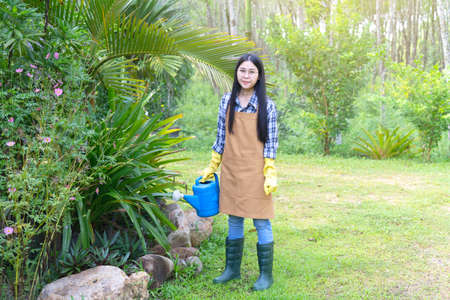 Selective focus,Beautiful young asian woman gardening