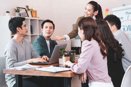 Business meeting-Group of young businesspeople have discussion business plan in office,...