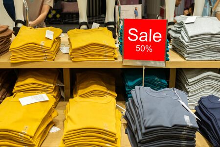 Sale mock up advertise display frame in the shopping department store. Shopping sale sign 50% sale at adepartment. Shopping concept, Advertisement conceptの写真素材