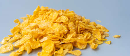 Cornflakes on gray background.の写真素材
