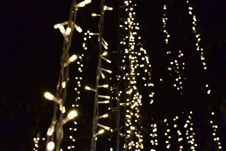 Yellow decorate light with black bckground.の写真素材