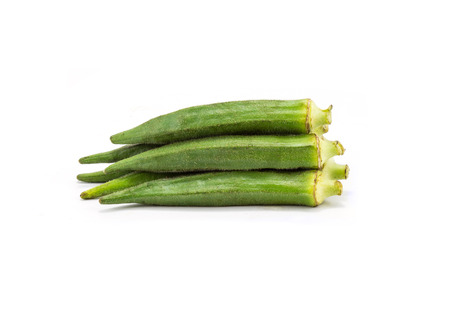 Fresh young okra isolated on white background の写真素材
