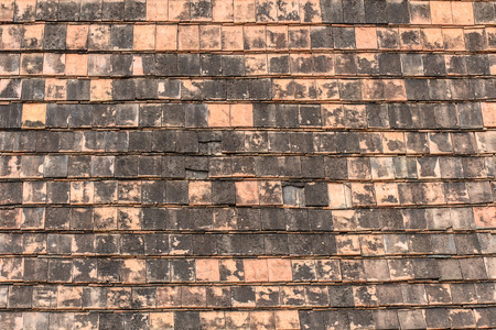 Old roof tiles made of terracottaの写真素材
