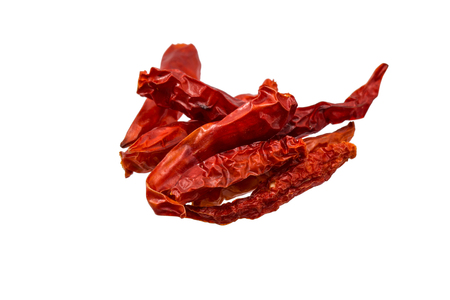 Dried red hot peppers isolated on white background.の写真素材