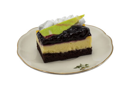 blueberry cheesecake isolated on white backgroundの写真素材