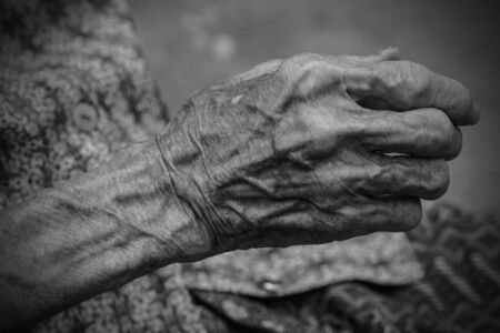 Hands of the old woman. Black and White.の写真素材