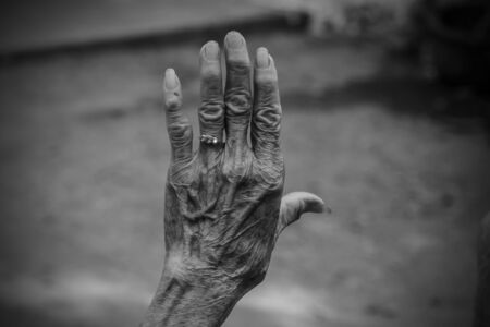 Hands of the old woman. Black and White.の写真素材