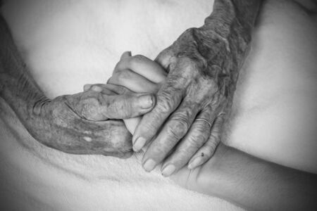 Hands of the old woman. Black and White.の写真素材