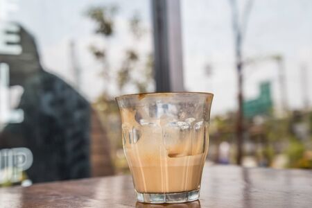 coffee latte cup on a wood table