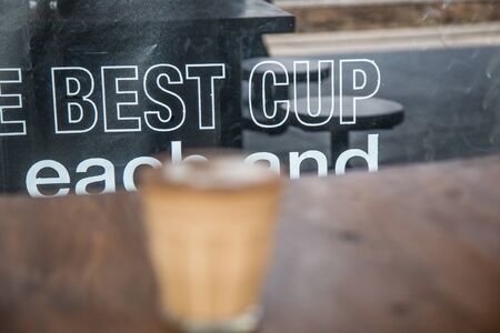 coffe latte cup on a wood table