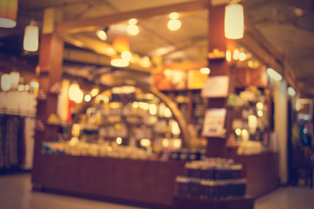 Blurred image of shopping mall and bokeh background - vintage effect style pictures.の写真素材