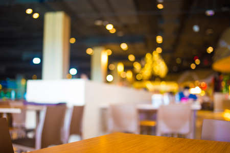 Coffee shop blur background with bokeh image.の写真素材