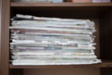 Blur image Stack of newspapersの写真素材