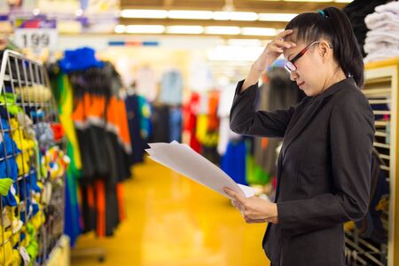 Business woman with a headache.の写真素材