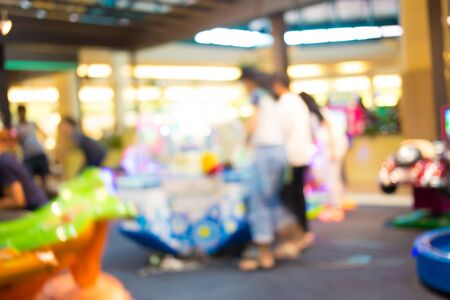 Arcade game machine shop blur with bokeh imageの写真素材