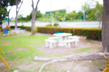 Defocused and blur image of children's playground at public park for background usage.の写真素材