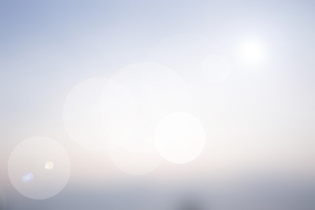 Blurred of sky with sun ray backgroundの写真素材