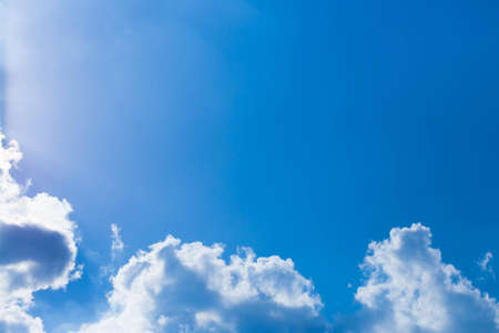 white cloud and blue sky background image.の写真素材