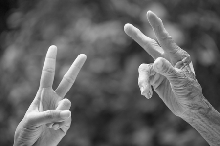 Old and young hands.の写真素材