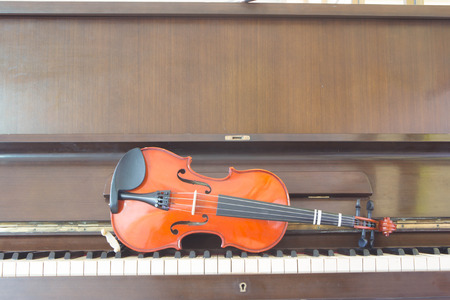 Violin on piano keys, closeupの写真素材