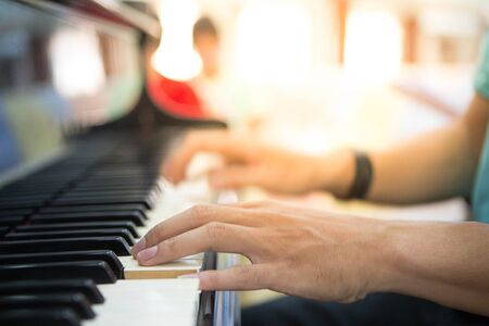 hands on the piano keysの写真素材