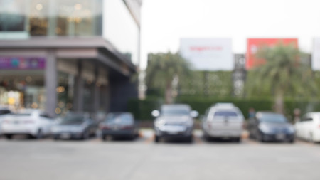 blur cars parking for use background.