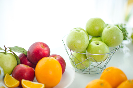 The fruits of health lover Healthy fruit And health care to eat healthy food. To the skin. The fruit is placed in a beautiful table, apple apricot, banana, orange, dragon, placed in the corner of the view.の写真素材