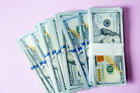 Concept of Dollar Dollars Closeup Concept One hundred dollar bills Lined up Payable taxes are legal.
