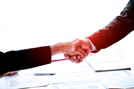 Businessmen shake hands Teamwork, teamwork, understanding, work To succeed On the jobの写真素材