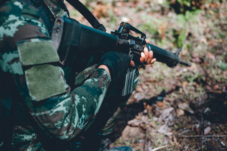 Soldiers are using the radio. And use the map For communication between military operations in the...