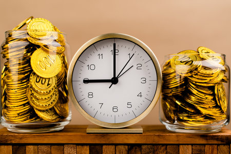 Saving gold. Saving money. Gold savings concept in a glass jar. Store gold in a glass jar.