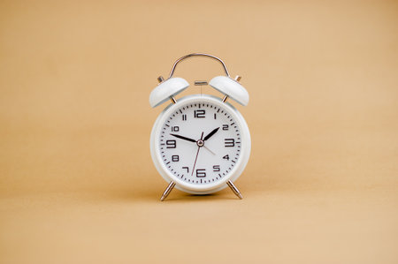 white alarm clock stop watch photoの写真素材