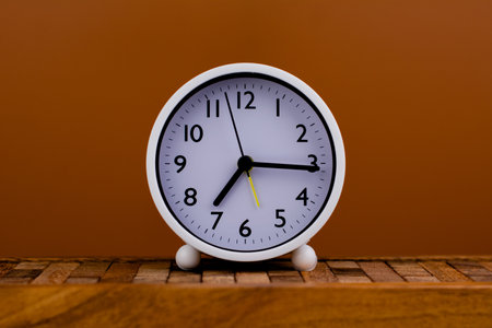 white alarm clock stop watch photoの写真素材